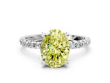 White gold Fancy Yellow Oval Cut Diamond Brilliant Solitaire Ring with Pavé Band and Four-Prong Setting_12