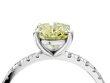 White gold Fancy Yellow Oval Cut Diamond Brilliant Solitaire Ring with Pavé Band and Four-Prong Setting_16