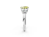 White gold Fancy Yellow Oval  Cut Diamond Cluster Ring with Round Accent Stones and Prong Setting on a Classic Band_51