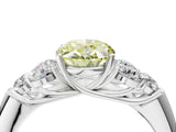 White gold Fancy Yellow Oval  Cut Diamond Cluster Ring with Round Accent Stones and Prong Setting on a Classic Band_53