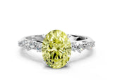 White gold Fancy Yellow Oval Cut Diamond Cluster Side Stone Solitaire Ring with Prong Setting_91