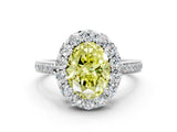White gold Fancy Yellow Oval Cut Diamond Floral Halo Ring with Pavé Band and Prong Setting_7