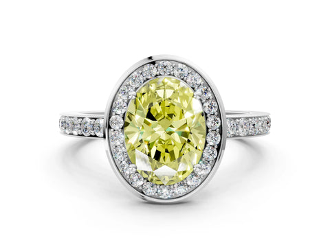 White gold Fancy Yellow Oval Cut Diamond Halo Ring with Bezel Frame and Pavé Band