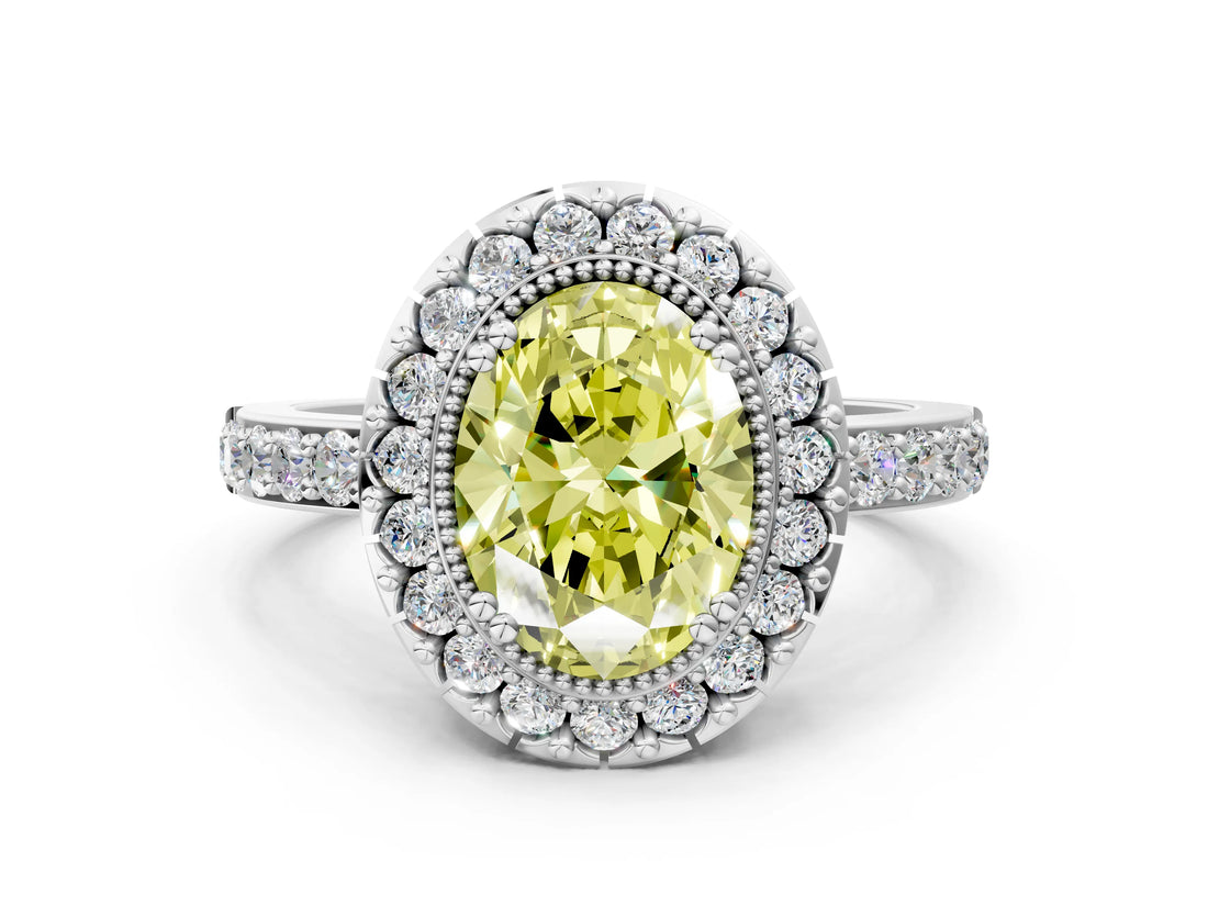 White gold Fancy Yellow Oval Cut Diamond Halo Ring with Pavé Band and Prong Setting