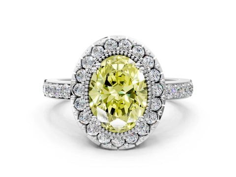White gold Fancy Yellow Oval Cut Diamond Halo Ring with Pavé Band and Prong Setting