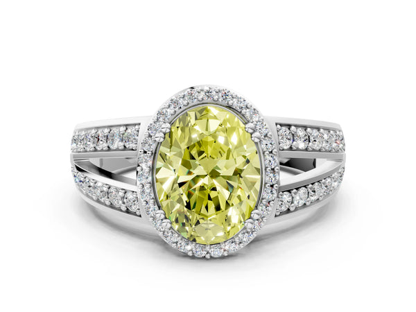 White gold Fancy Yellow Oval Cut Diamond Halo Ring with Split Shank Pavé Band and Four-Prong Setting