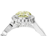 White gold Fancy Yellow Oval Cut Diamond Halo Ring with Vintage Split Shank and Four-Prong Setting_101
