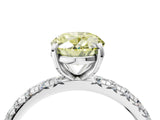 White gold Fancy Yellow Oval Cut Diamond Pavé Solitaire Ring with Round Band and Prong Setting_24