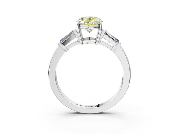White gold Fancy Yellow Oval  Cut Diamond Ring with Tapered Baguette Side Stones in Four-Prong Setting
