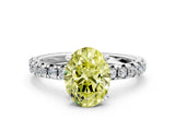 White gold Fancy Yellow Oval Cut Diamond Solitaire Pavé Engagement Ring with Round Band and Prong Setting_50