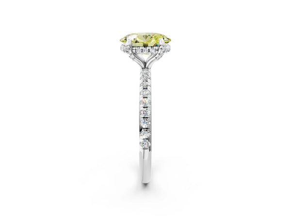 White gold Fancy Yellow Oval Cut Diamond Solitaire Ring with Four-Prong Setting and Pavé Band