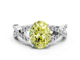 White gold Fancy Yellow Oval Cut Diamond Solitaire Ring with Four-Prong Setting and Twisted Pavé Band_65