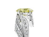 White gold Fancy Yellow Oval Cut Diamond Solitaire Ring with Prong Setting and Twisted Pavé Band_5