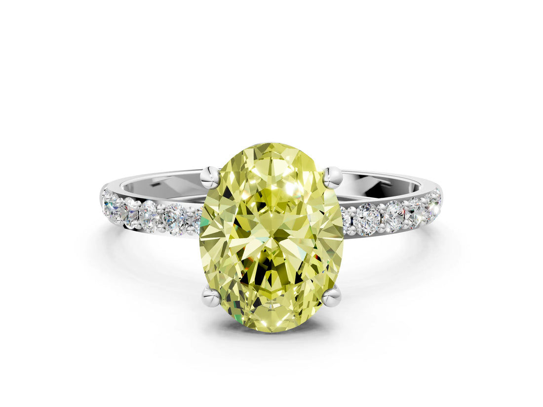 White gold Fancy Yellow Oval Cut Diamond Solitaire Ring with Round  Pavé Band and Prong Setting_185