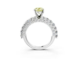 White gold Fancy Yellow Oval Cut Diamond Solitaire Ring with Shared Prong Pavé Band and Four-Prong Setting_63