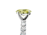 White gold Fancy Yellow Oval Cut Diamond Solitaire Ring with Shared Prong Pavé Band and Four-Prong Setting_65