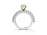 White gold Fancy Yellow Oval Cut Diamond Solitaire Ring with Shared Prong Pavé Band and Four-Prong Setting_71