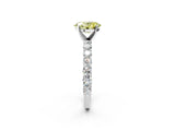 White gold Fancy Yellow Oval Cut Diamond Solitaire Ring with Shared Prong Pavé Band and Four-Prong Setting_74