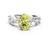 White gold Fancy Yellow Oval Cut Diamond Solitaire Ring with Twisted Band and Prong Setting_242