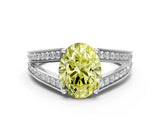 White gold Fancy Yellow Oval Cut Diamond Split Shank Ring with Pavé Band and Four-Prong Setting_61
