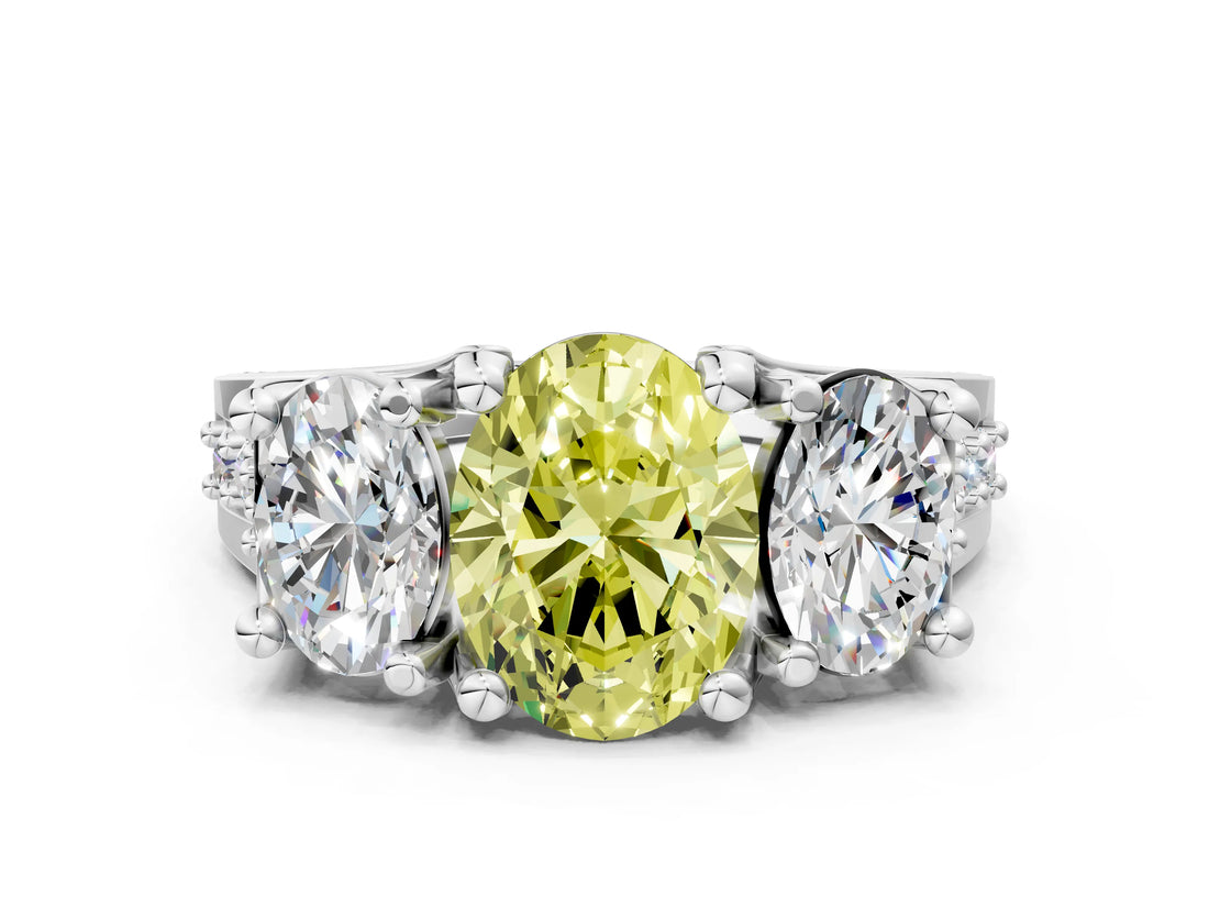 White gold Fancy Yellow Oval Cut Diamond Three-Stone Ring with Channel Set Band and Four-Prong Setting_78