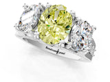 White gold Fancy Yellow Oval Cut Diamond Three-Stone Ring with Channel Set Band and Four-Prong Setting_79