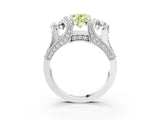White gold Fancy Yellow Oval Cut Diamond Three-Stone Ring with Channel Set Band and Four-Prong Setting_81