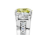 White gold Fancy Yellow Oval Cut Diamond Three-Stone Ring with Channel Set Band and Four-Prong Setting_83