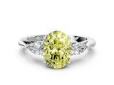 White gold Fancy Yellow Oval Cut Diamond Three-Stone Ring with Pear  Side Stones and Prong Setting_144