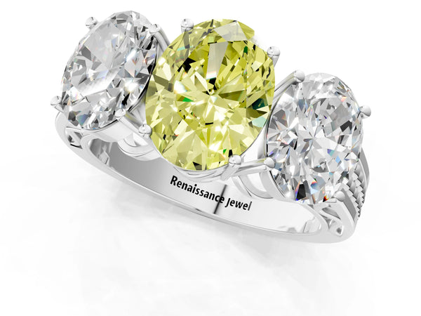 Platinum Fancy Yellow Oval Cut Diamond Three-Stone Ring with Prong Setting and Textured Band