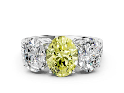 White gold Fancy Yellow Oval Cut Diamond Three-Stone Ring with Prong Setting and Textured Band