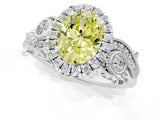 White gold Fancy Yellow Oval Cut Halo Diamond Ring with Milgrain and Bezel Accents on a Split Shank Band_1