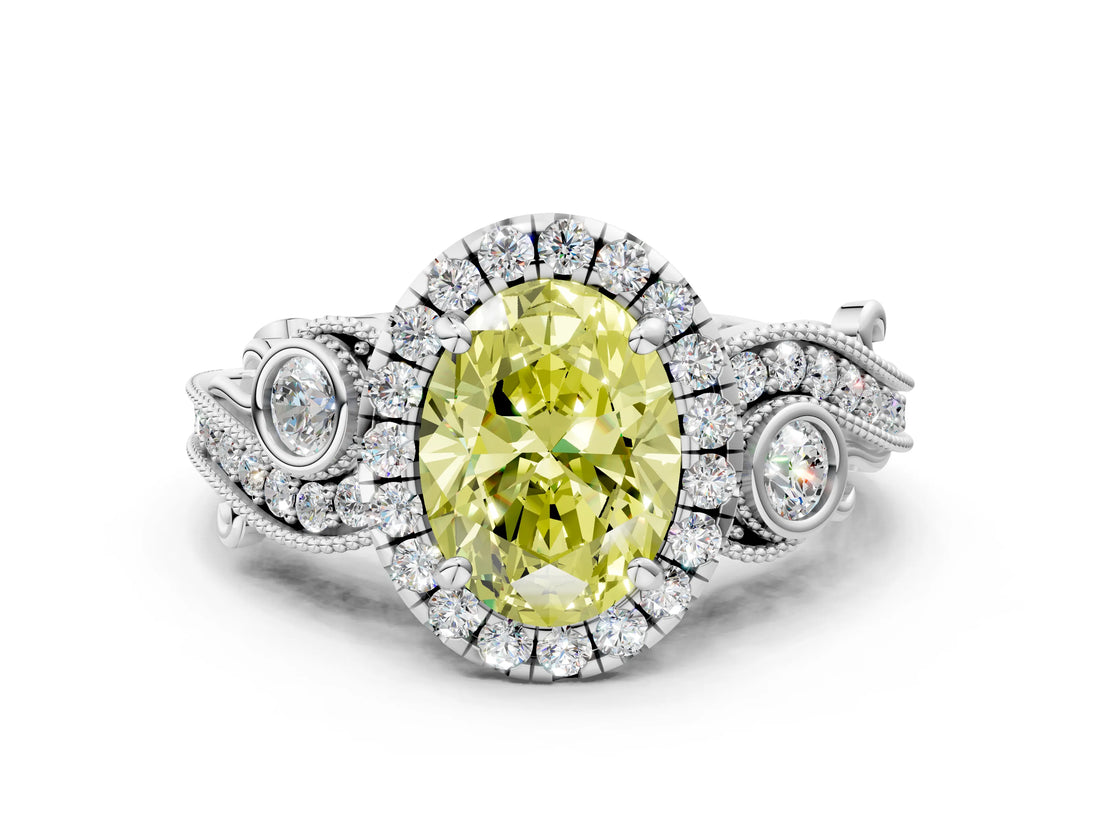 White gold Fancy Yellow Oval Cut Halo Diamond Ring with Milgrain and Bezel Accents on a Split Shank Band
