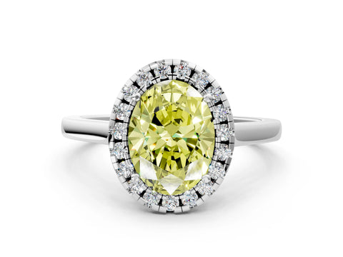 White gold Fancy Yellow Oval Cut Halo Round Diamond Solitaire Ring with Pavé Band and Four-Prong Setting