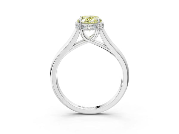 Platinum Fancy Yellow Oval Cut Solitaire Diamond Engagement Ring with Four-Prong Setting and Tapered Band