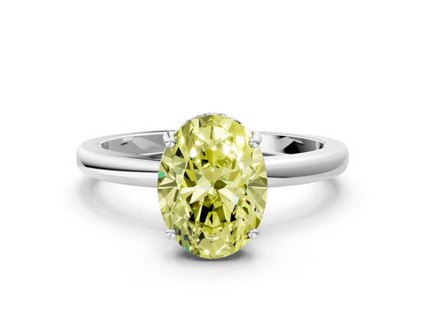 White gold Fancy Yellow Oval Cut Solitaire Diamond Ring with Prong Setting and Plain Band