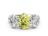 White gold Fancy Yellow Oval Cut Three-Stone Diamond Ring with Prong Setting on a Classic Band_18