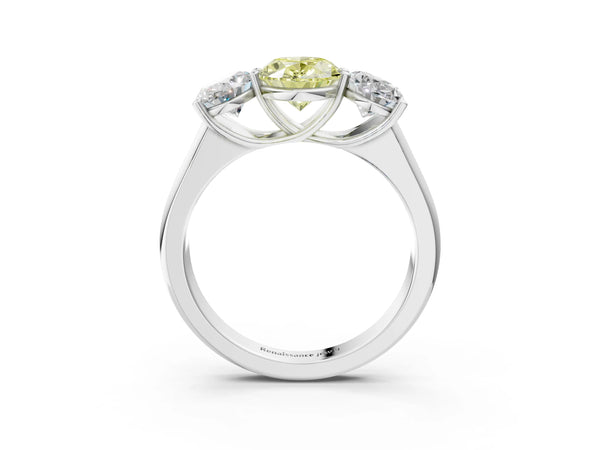 White gold Fancy Yellow Oval Cut Three-Stone Diamond Ring with Prong Setting on a Classic Band