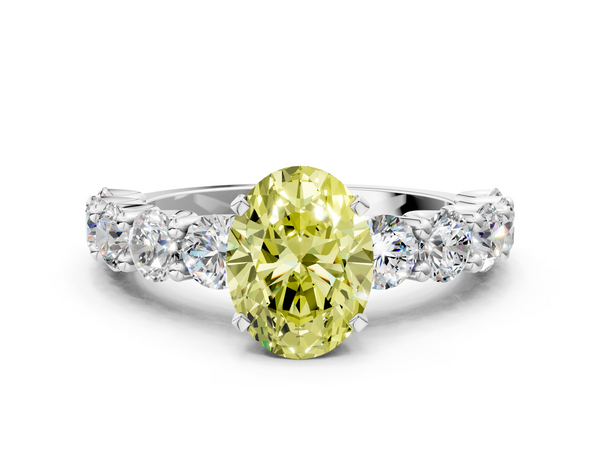 White gold Fancy Yellow Oval Cut Diamond Prong Setting with Side Stones on a Pave Band