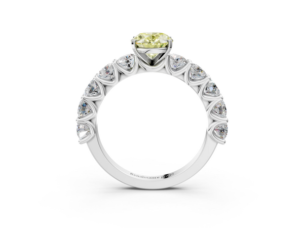White gold Fancy Yellow Oval Cut Diamond Prong Setting with Side Stones on a Pave Band