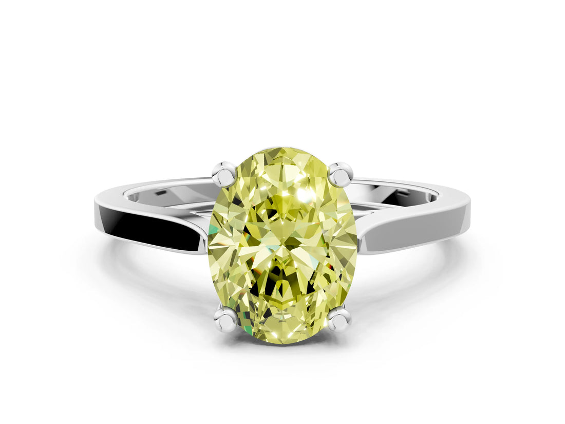 White gold Fancy Yellow Oval  Solitaire Diamond Ring with Four-Prong Setting and Tapered Band
