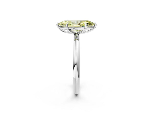 White gold Fancy Yellow Oval  Solitaire Diamond Ring with Four-Prong Setting on a Plain Band