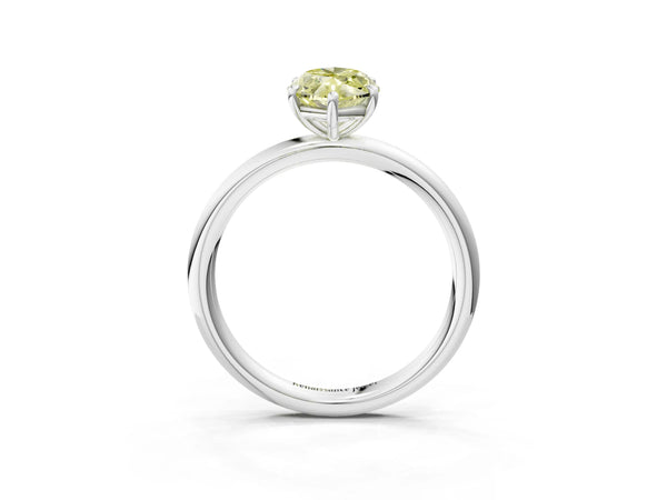 White gold Fancy Yellow Oval  Solitaire Diamond Ring with Four-Prong Setting on a Plain Band