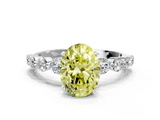 White gold Fancy Yellow Oval  Solitaire Diamond Ring with Pave Band and Four-Prong Setting_262