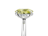 White gold Fancy Yellow Oval  Solitaire Diamond Ring with a Classic Band and Four-Prong Setting 5