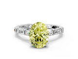 White gold Fancy Yellow Oval  Solitaire with Side Baguettes and Channel Set Band_106