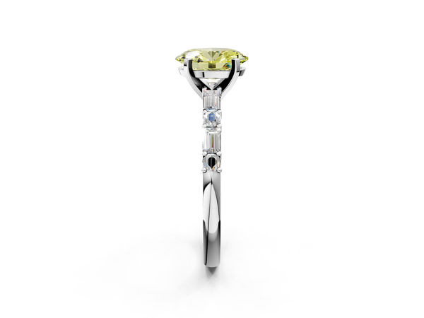 Platinum Fancy Yellow Oval Cut Diamond Solitaire with Side Baguettes and Channel Set Band