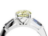 White gold Fancy Yellow Oval  Solitaire with Tapered Baguette Side Stones on a Classic Band with Four-Prong Setting_90