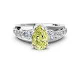 White gold Fancy Yellow Pear  Brilliant Solitaire with Side Stones on a Pave Band and Four-Prong Setting_72