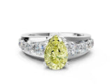 White gold Fancy Yellow Pear  Brilliant Solitaire with Side Stones on a Pave Band and Four-Prong Setting_85
